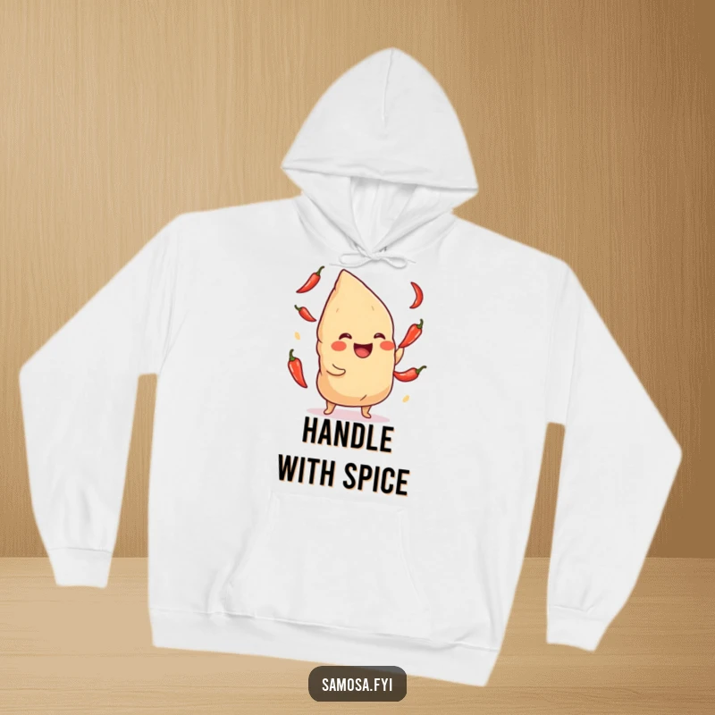 Funny Samosa Hoodie: A warm sweatshirt featuring a laughing samosa juggling chili peppers, perfect for spicy humor lovers.